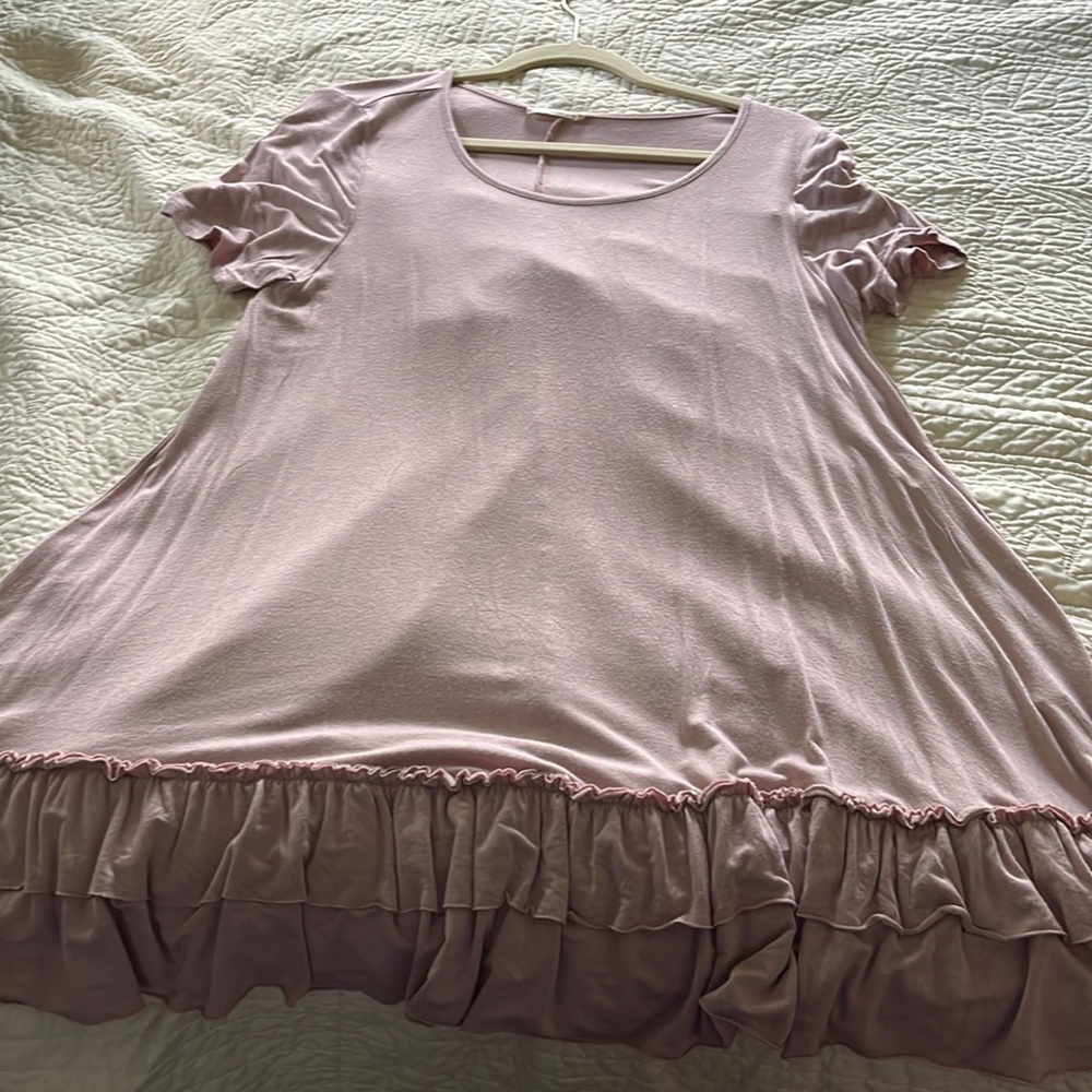 Like new short sleeve ruffled tunic